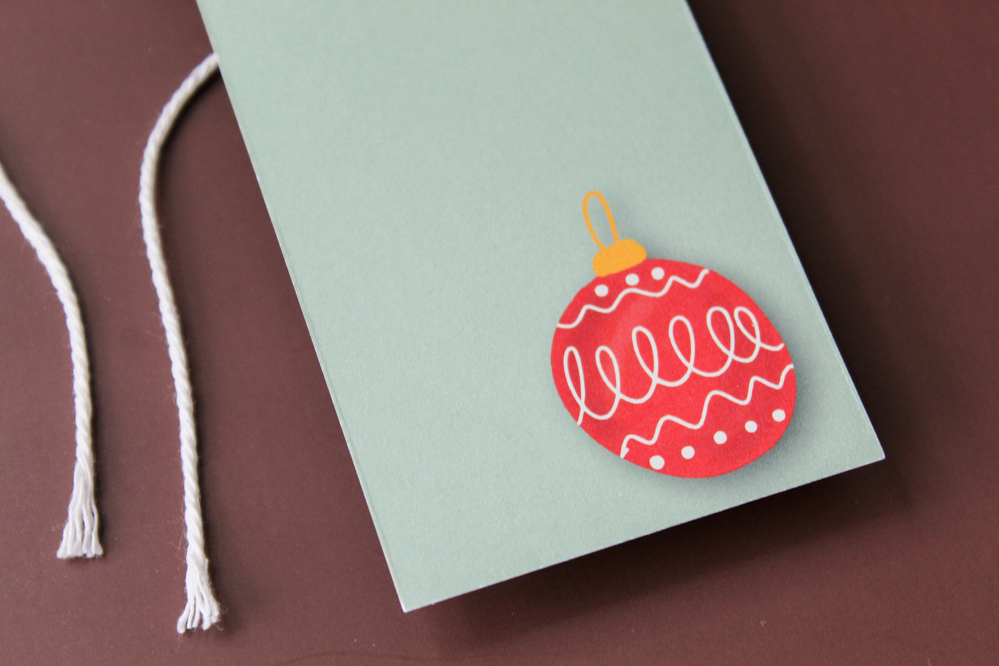 Our Red Vintage Christmas Ornament gift tags add a festive touch to your holiday presents. These cute tags come in sets of eight and include pre-cut string.
