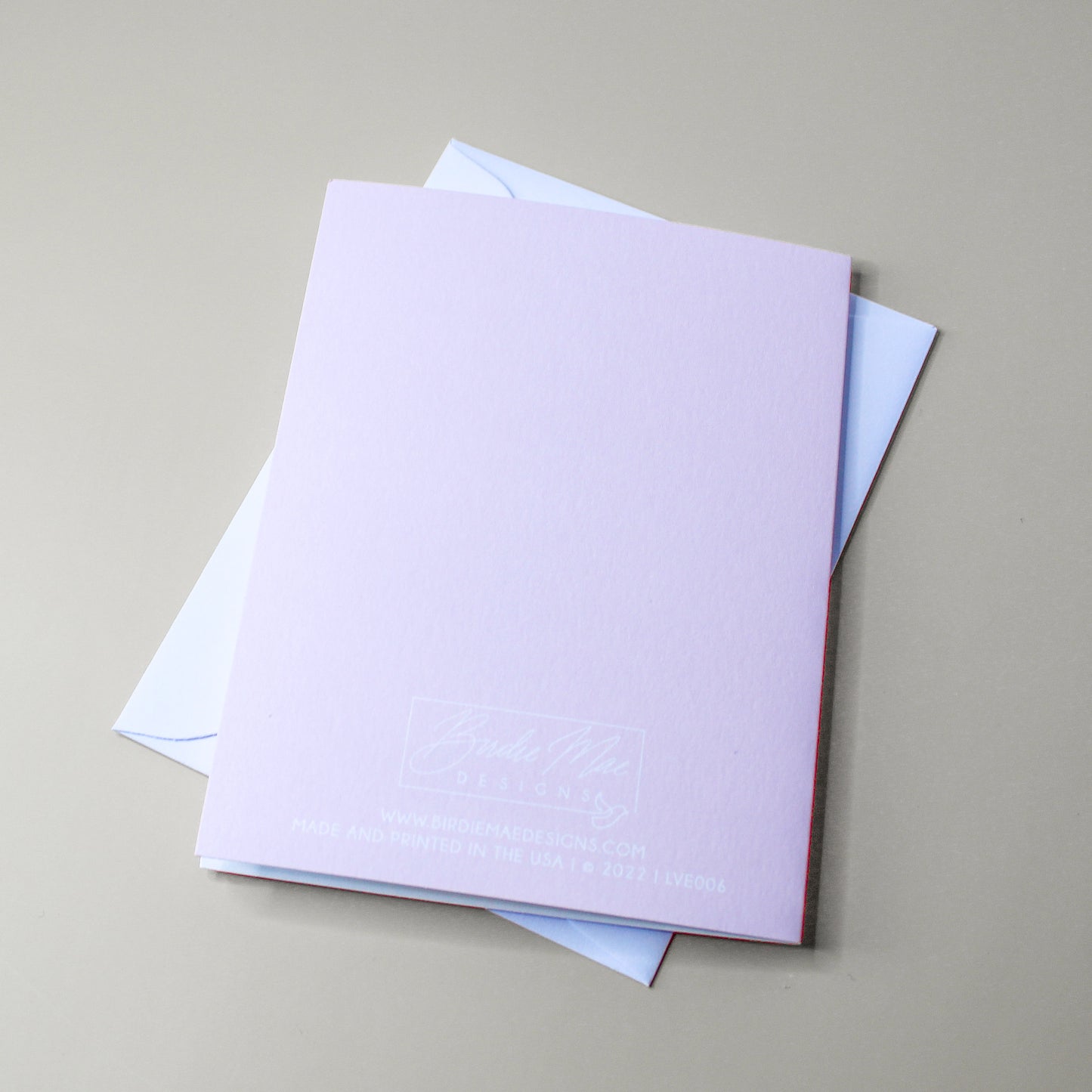 Our "Happy Anniversary" greeting card is too cute! Each card is folded to 4.25" tall by 5.5" wide, is blank inside and comes with a matching white envelope. Cards are packaged in cellophane sleeves.