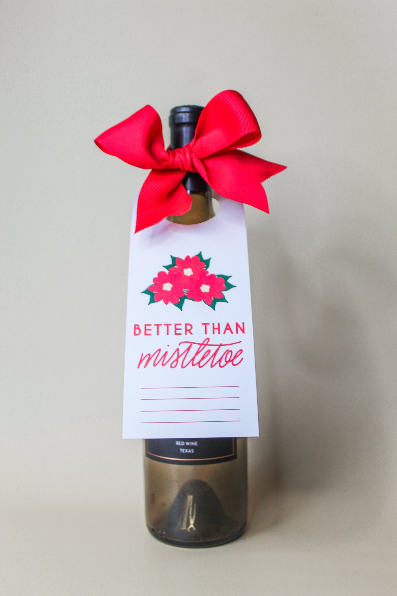 hostess gift, 'Better Than Mistletoe' Bottle Neck Gift Tags. Each tag comes with pre-cut ribbon for effortless presentation 