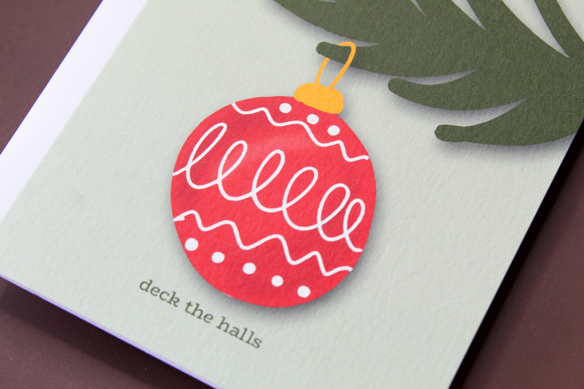 "Deck the Halls" Christmas Greeting spreads some holiday cheer with an illustrated vintage red Christmas ornament.