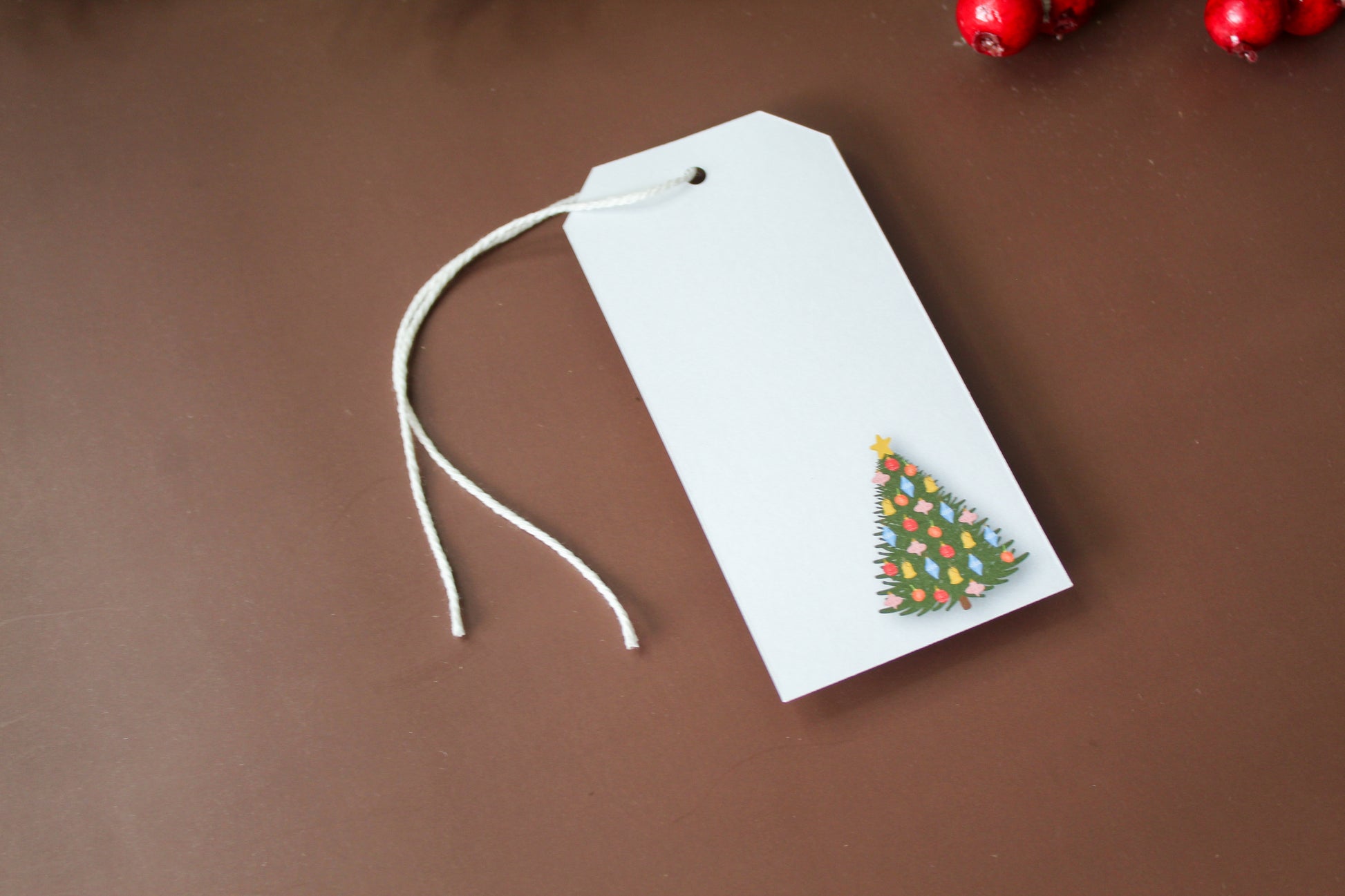 Our Colorful Vintage Ornament Christmas Tree gift tags add a festive touch to your holiday presents. These cute tags come in sets of eight and include pre-cut string. 