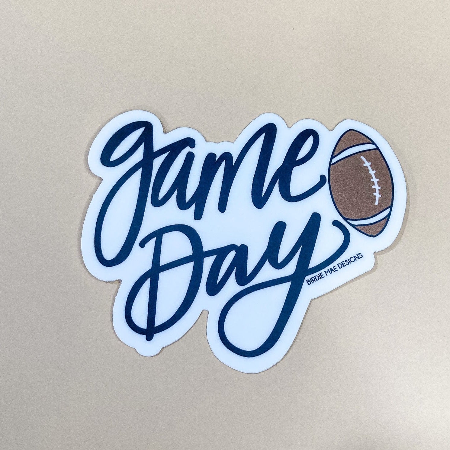 Game Day Football Sticker. Crafted from durable vinyl and dishwasher safe, it's the ideal addition to your tumbler