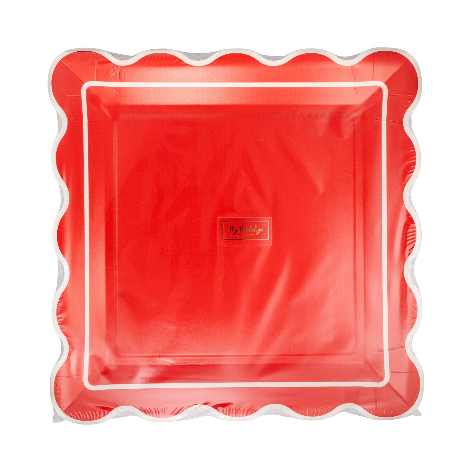 Red scalloped-edge plastic plate on a white background