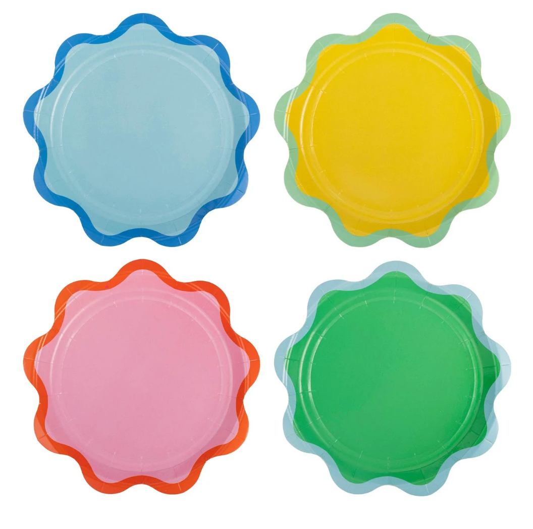 set of four scalloped dessert plates in blue, yellow, pink, and green