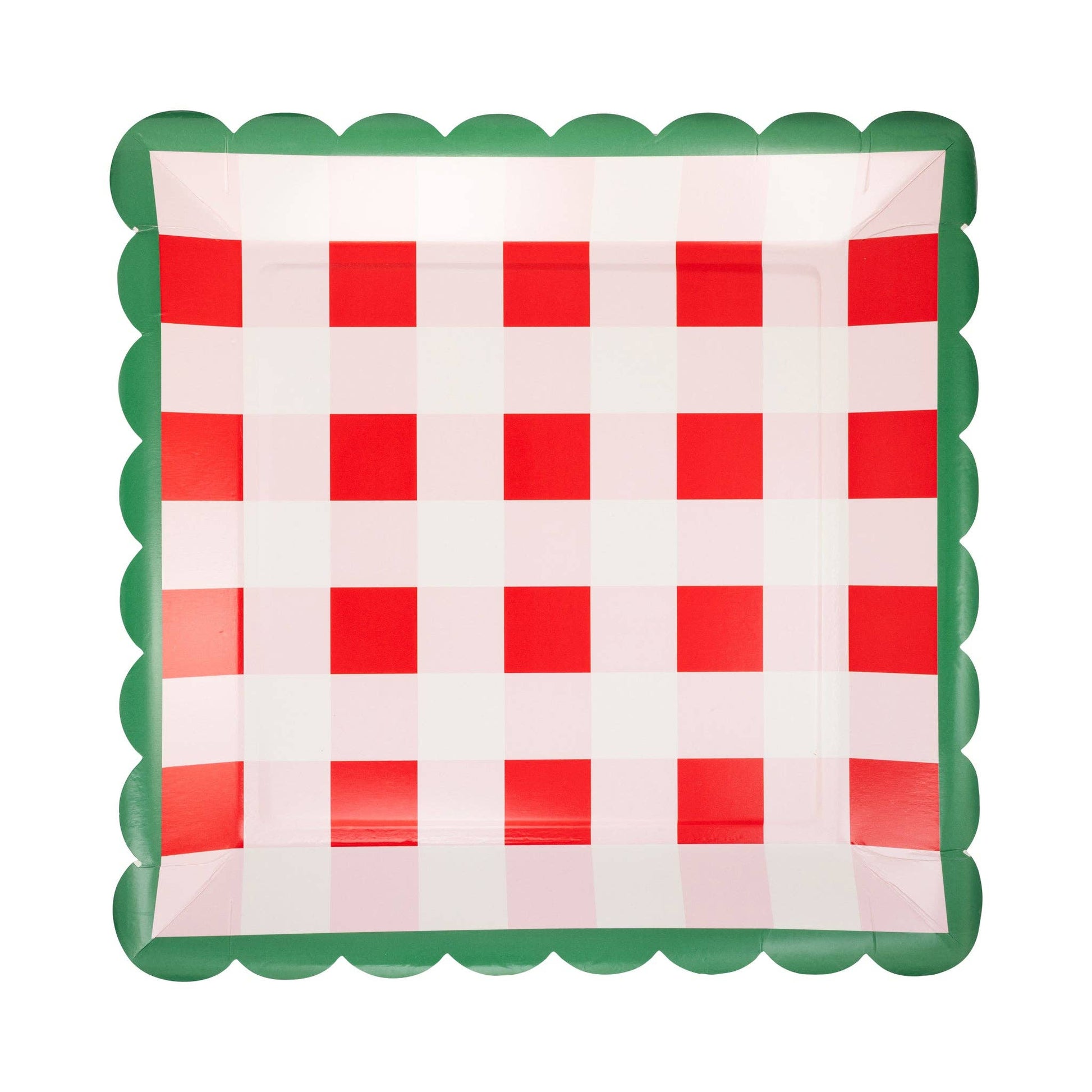 Checkered paper plate with red and white squares and green border on a white background