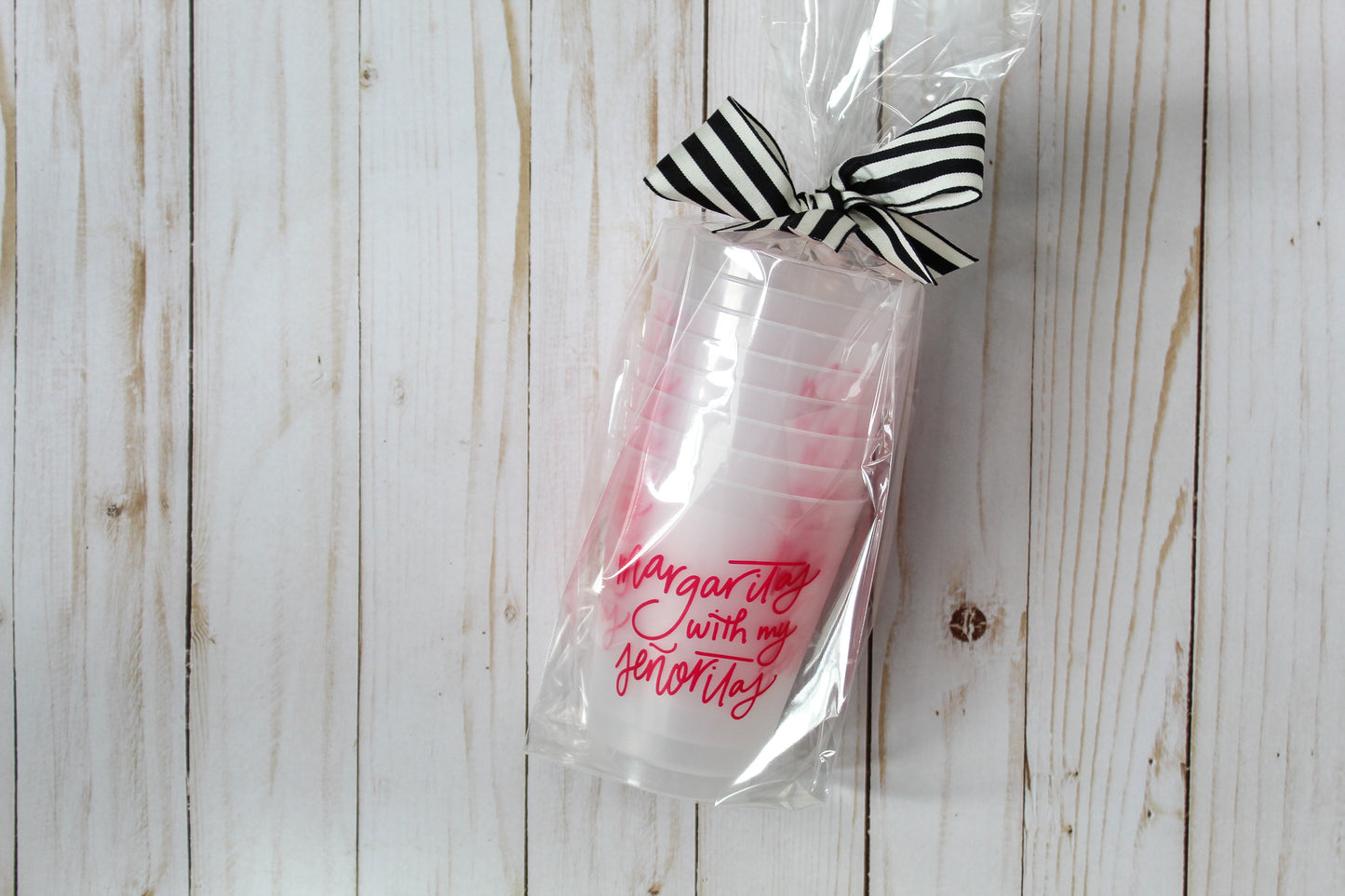The "Margaritas With My Senoritas" Party Cups are perfect for your next girls night or bachelorette party! Best of all, you can use these time and time again - they're dishwasher safe! Cups come in a cellophane sleeve with a black and white striped ribbon tied in a bow at the top. 