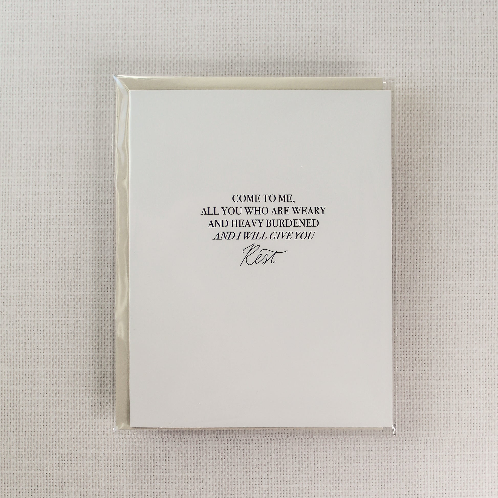 'Come to Me & I Will Give You Rest' encouraging greeting card. Featuring the uplifting message, 'Come to me all you who are weary and heavy burdened and I will give you rest,' this card provides a heartfelt message of solace.