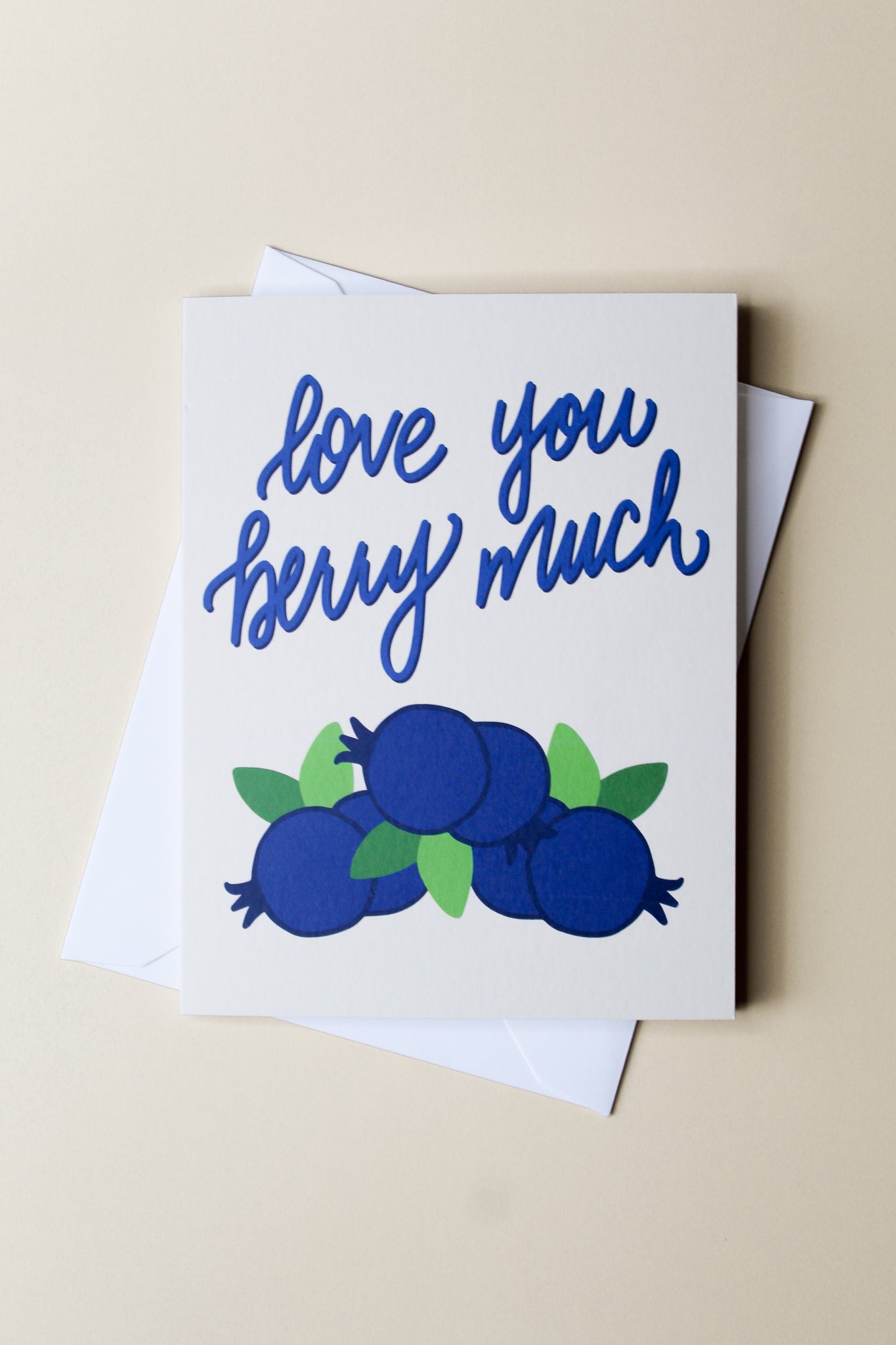 "Love You Berry Much"   This card is part of our cheerful fruit collection and so sweet for a little note of love or thanks to a special friend or child. Each card is folded to 4.25" tall by 5.5" wide, is blank inside and comes with a matching white envelope. Cards are packaged in cellophane sleeves. 