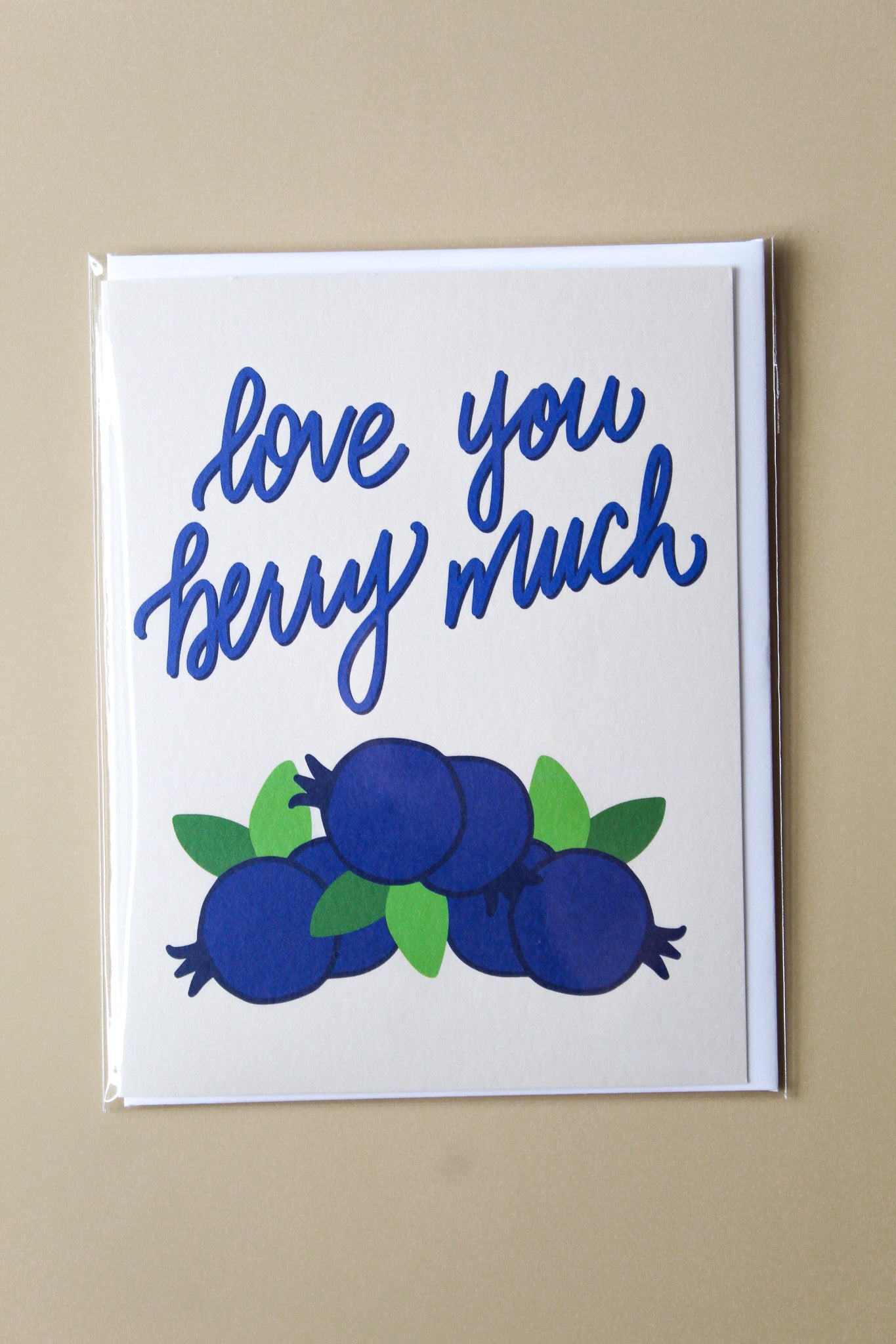 "Love You Berry Much"   This card is part of our cheerful fruit collection and so sweet for a little note of love or thanks to a special friend or child. Each card is folded to 4.25" tall by 5.5" wide, is blank inside and comes with a matching white envelope. Cards are packaged in cellophane sleeves. 