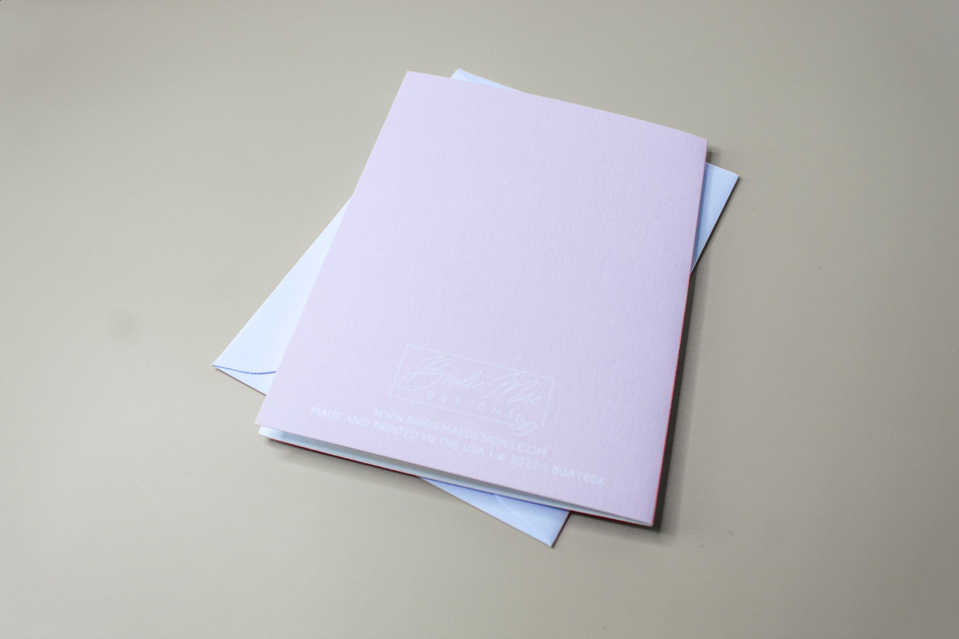 Our "Happy Birthday" card is too cute! Each card is folded to 4.25" tall by 5.5" wide, is blank inside and comes with a matching white envelope. Cards are packaged in cellophane sleeves.
