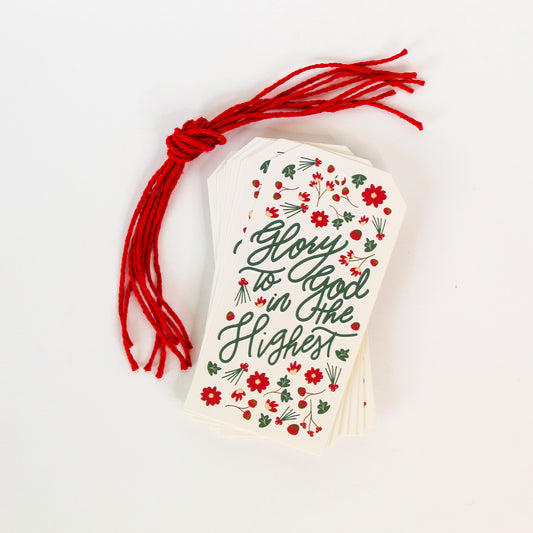 "Glory to God in the Highest" Christmas gift tags add a festive touch to your holiday presents. These cute tags come in sets of eight and include red string.