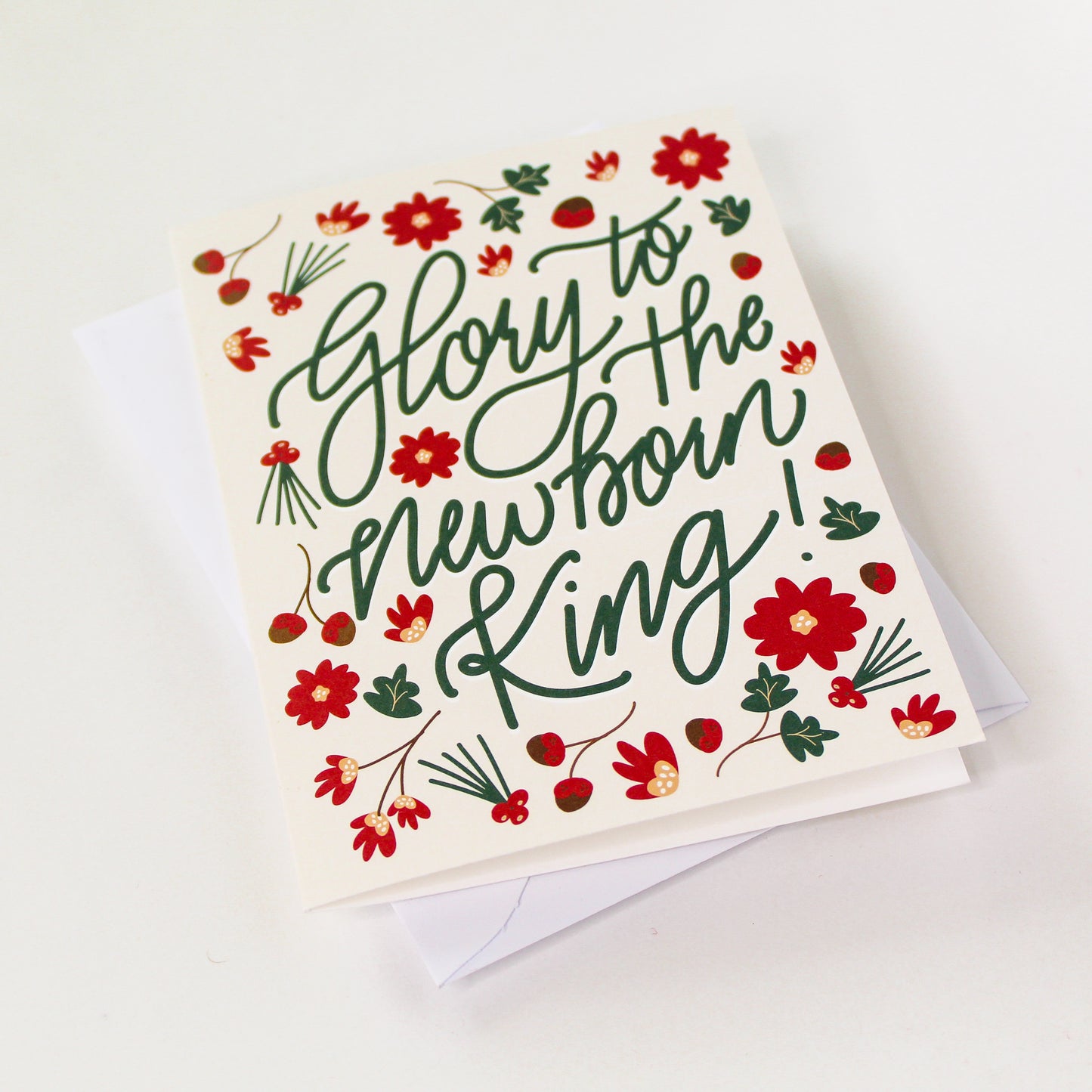 "Glory to the Newborn King!" Christmas Greeting Card is a festive way to bring joy during the holiday season. Each card is folded to 4.25" tall by 5.5" wide, is blank inside and comes with a matching white envelope. Cards are packaged in cellophane sleeves.