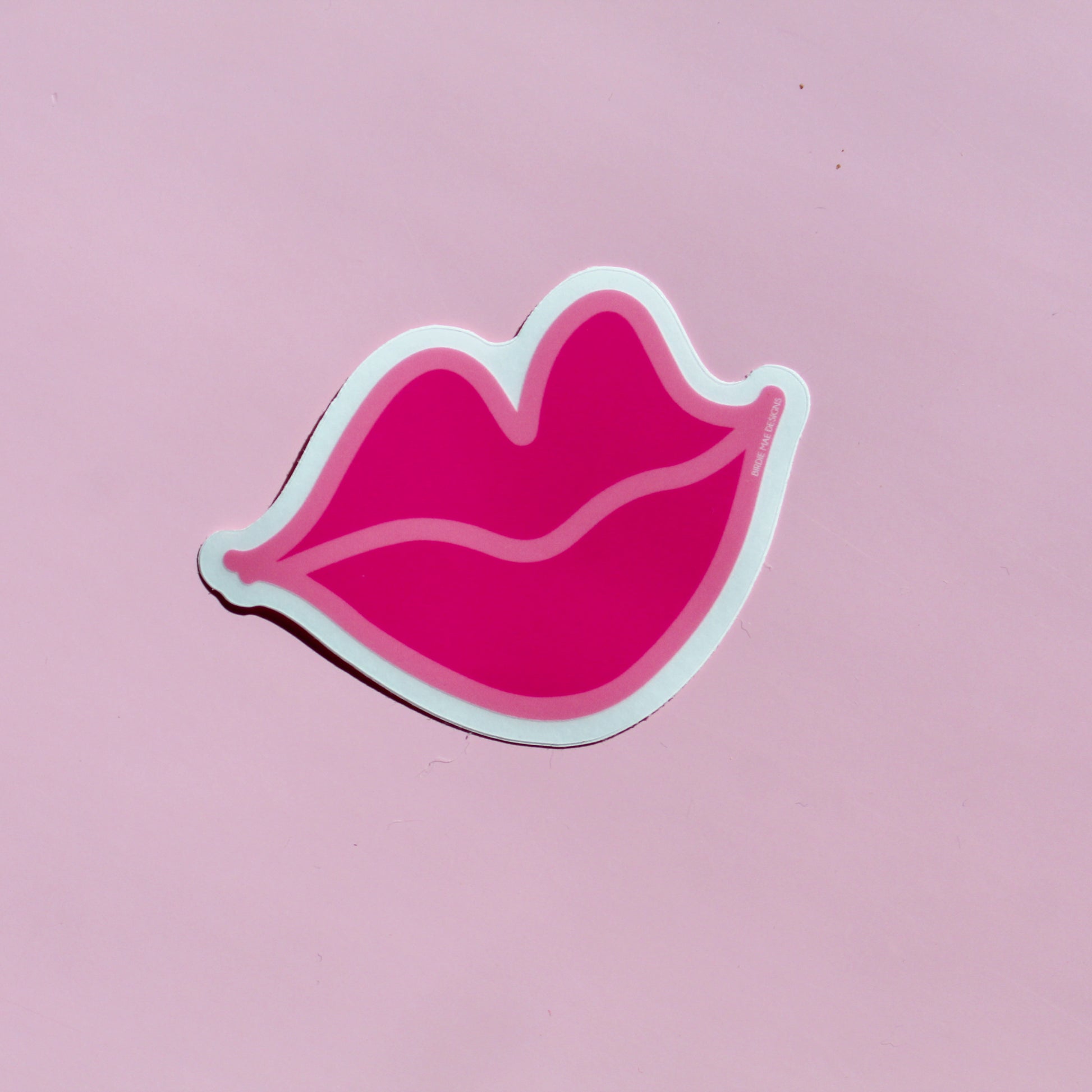 kissy lips sticker. durable vinyl and dishwasher-safe construction 
