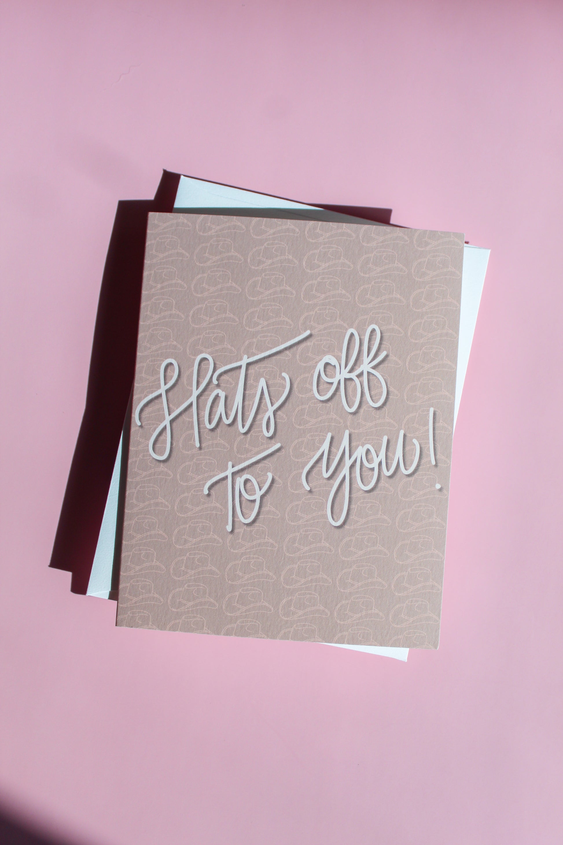 Our "Hats Off To You!" greeting card Each card is folded to 4.25" tall by 5.5" wide, is blank inside and comes with a matching white envelope. Cards are packaged in cellophane sleeves. Perfect way to accent an gift to say congratulations or good luck! 