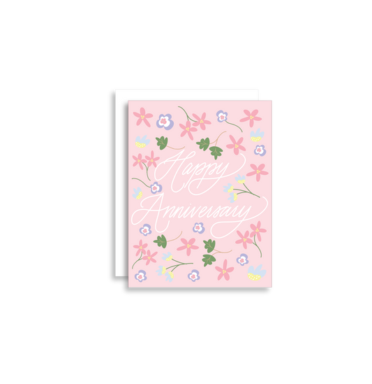 Our "Happy Anniversary" greeting card is too cute! Each card is folded to 4.25" tall by 5.5" wide, is blank inside and comes with a matching white envelope. Cards are packaged in cellophane sleeves.